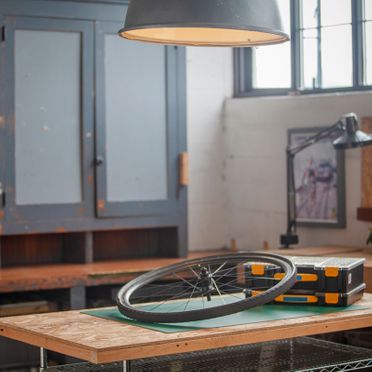 Work bench with bicycle wheel